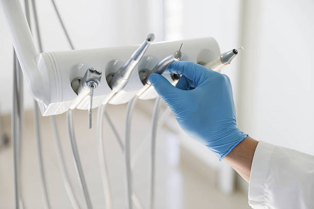 Professional Emergency Dentist technician working in Lawrenceburg, KY
